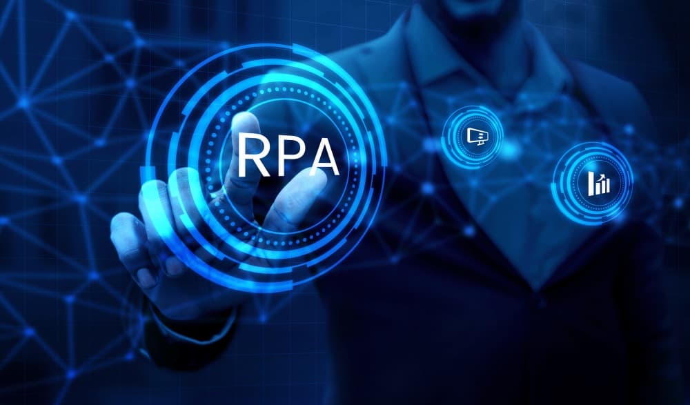 Automating Repetitive Administrative Tasks with tools like Robotic Process Automation (RPA)